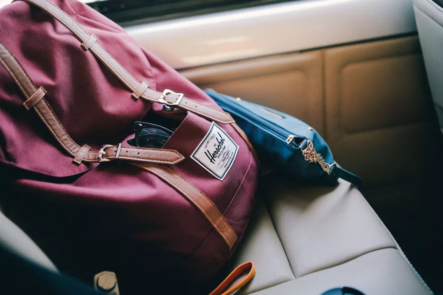 Keep frequently used items in accessible pockets while traveling