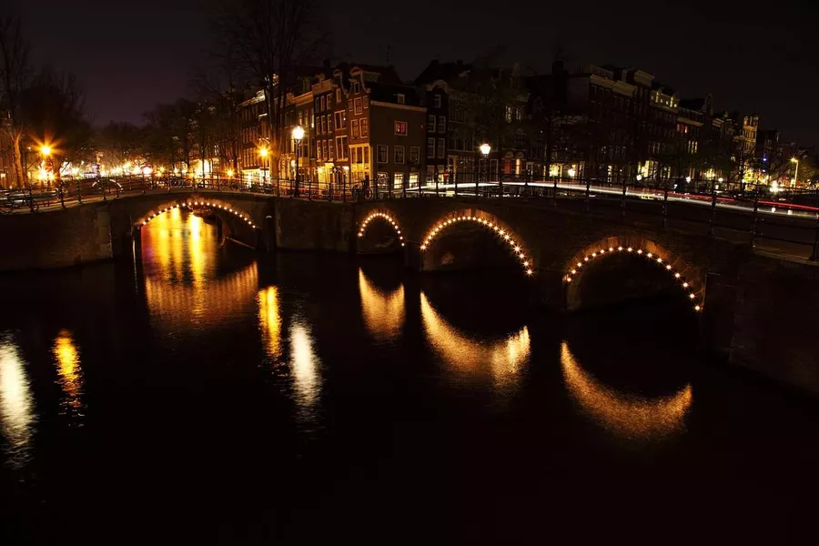 night view of Bridge of 15 Bridges in Amsterdam, Netherlands